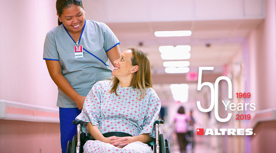 nurse with patient in wheelchair